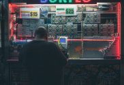 A man buys a lottery ticket at a kiosk / Dutch politician poses complete ban on gambling advertising